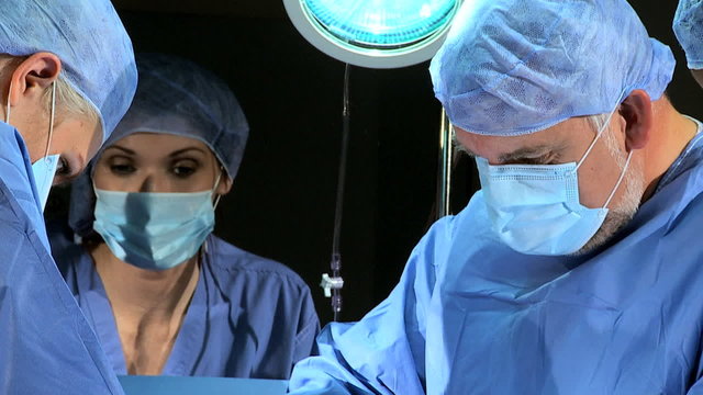 Surgical Team in Operating Theater Close Up