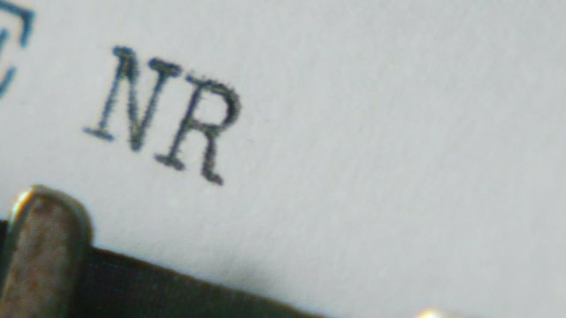 Typing "geheimsache" on an old typewriter