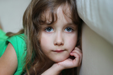 Portrait of a depressed little girl
