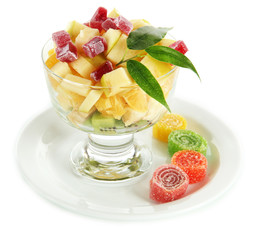 Fruit salad in a sundae dish isolated on white