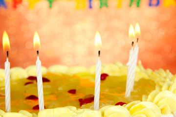 Happy birthday cake, on red background