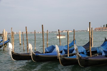 Fototapeta na wymiar gondolas in Venice lagoon docked at the port