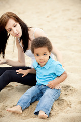 Multi-Ethnic family relaxing together outdoors