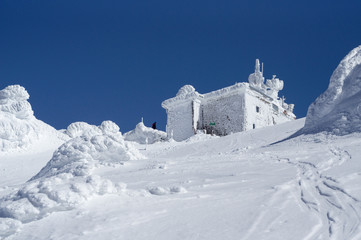 Mountaintop weather station in winter