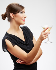 Young happy woman in black dress with glass.