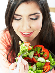 Woman eating green  salad