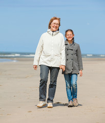 Family walking on the beach