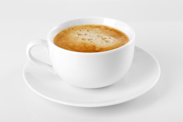 A cup of delicious espresso coffee on a white background