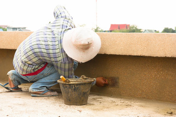 facade builder plasterer at work