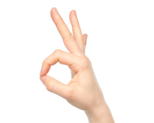 Hand OK sign isolated on white background .