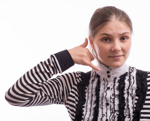 woman holds her hands to the ear