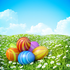 Fototapeta premium Easter Background with decorated Easter eggs on green lawn.