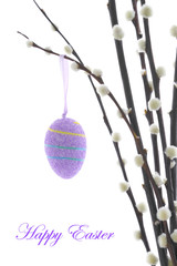 Easter eggs hanging on a pussy willow branch