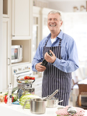 Fototapeta na wymiar Senior Man in the Kitchen