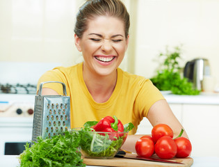 woman cooking vegetables