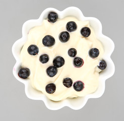 blueberries cream in a white bowl