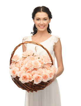 woman with basket full of flowers