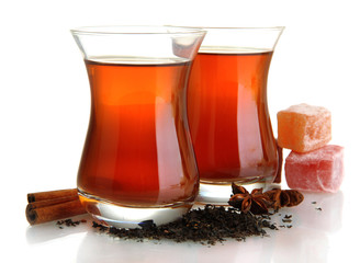 glasses of Turkish tea and rahat Delight, isolated on white