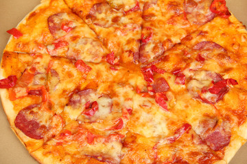 Tasty pizza in box close-up