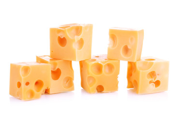 Cheese cubes isolated on white