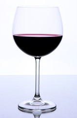 Red wine glass isolated on white