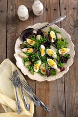 Spring salad with green pea, potato and eggs