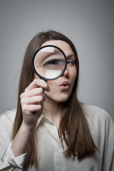 Woman with magnifier