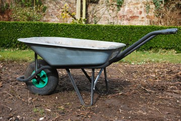 Empty garden wheelbarrow