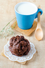 .Chocolate biscuit with a Cup of milk