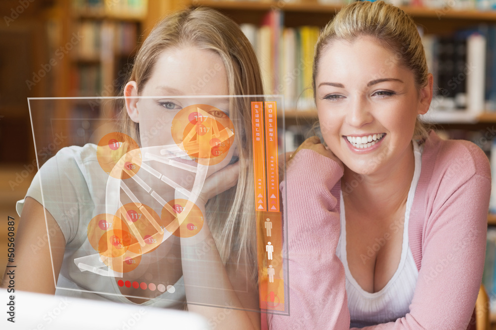Poster two smiling students looking at laptop and futuristic interface