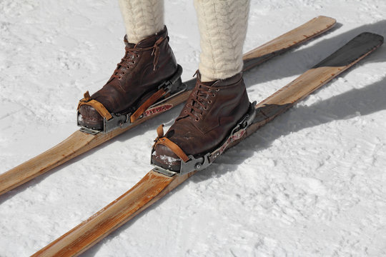 Old Vintage Wooden Skis And Leather Ski Boots