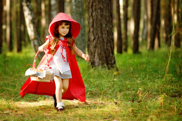 girl runs on the wood. the fairy tale 