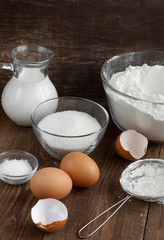 Ingredients for the dough on the wooden table