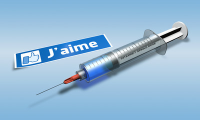 a syringe for addict with a message in French