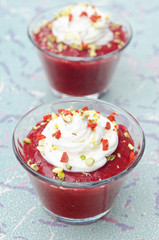 dessert with strawberry jam and whipped cream top view