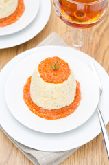 mousse of chicken with pumpkin, green and red pepper sauce
