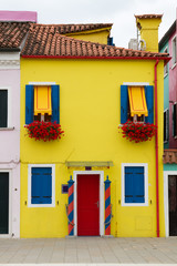 Typical colourful house in Burano, Italy. - 50573242