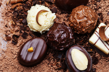chocolate pralines on a chocolate background