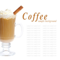Coffee cup with whipped cream and cinnamon isolated on white