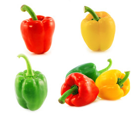 Red,green and yellow bell peppers on white background