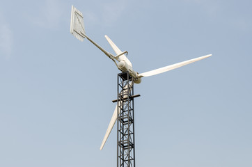 Wind generator on top of the mast