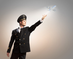 Image of pilot touching air