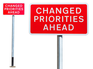 set of 2 isolated road signs changed priorities ahead