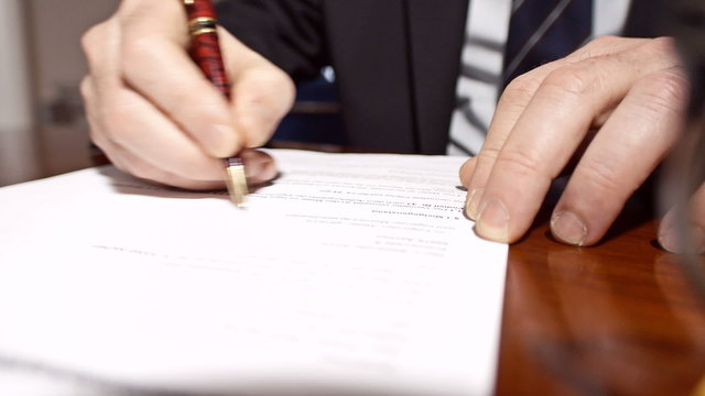 Businessman signing a contract