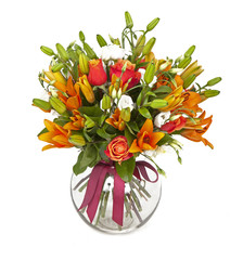 bouquet of orange lilias and roses in vase isolated on white