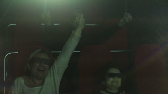 family watching 5D movie