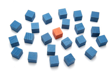 Concept photo think different one orange block and blue blocks