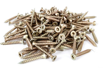 Closeup pile of screw on white