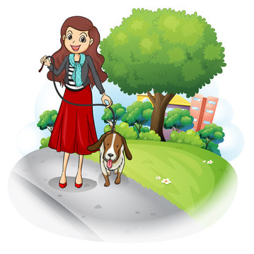 A woman with her dog at the road