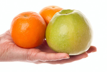 Hant with apple and orange